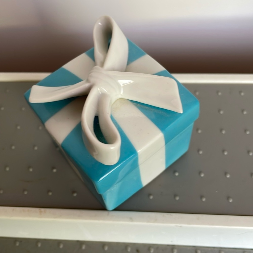 Tiffany & Co Blue Box with white ribbon.